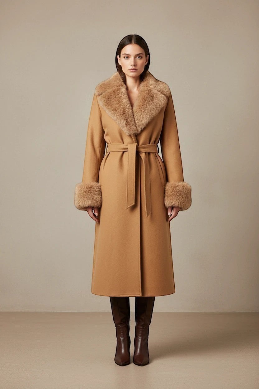 Refined Elegance camel long trench coat with plush faux fur collar and cuffs and a belted waist on a female model.