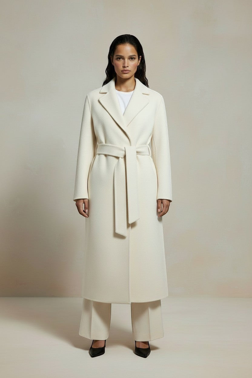 Refined Elegance cream cashmere blend belted wrap coat with structured lapels worn by a model