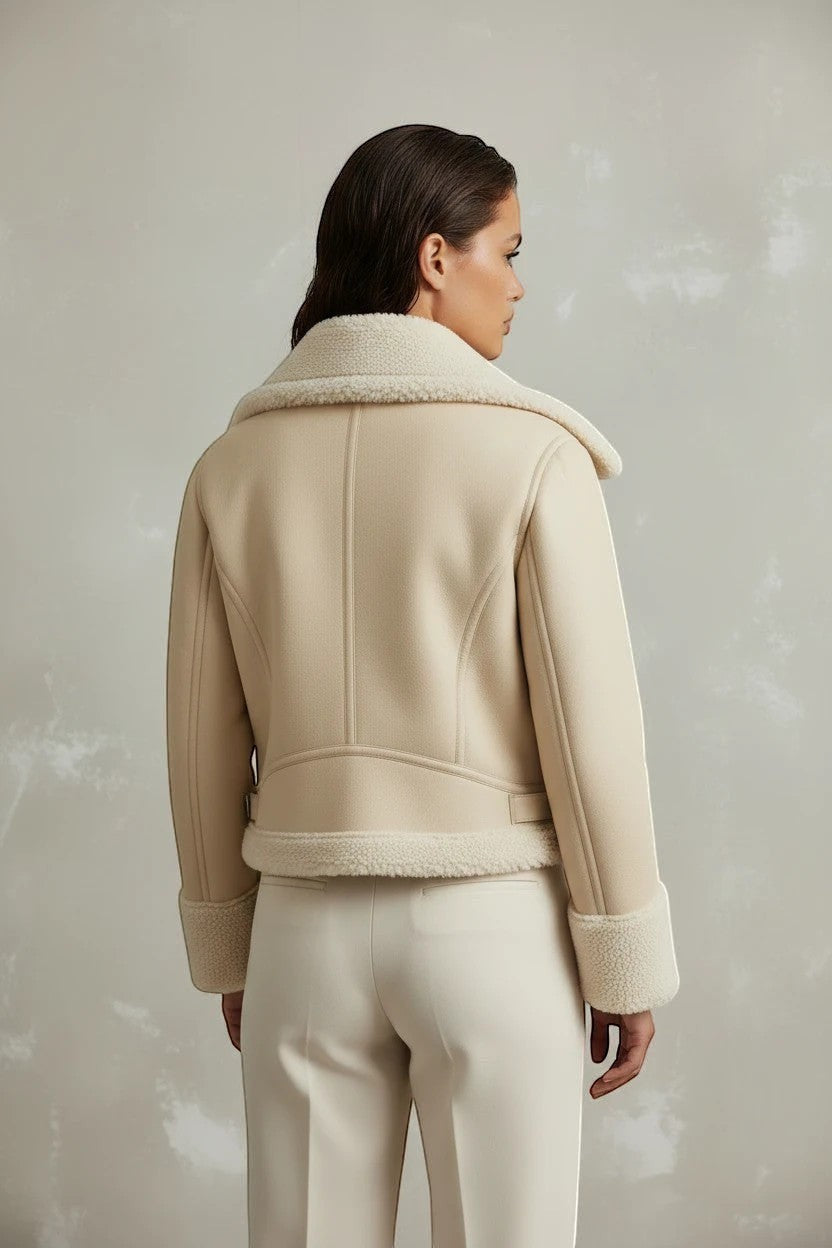 Refined Elegance cream faux shearling biker jacket with plush lining and buckle hem detail, back view.